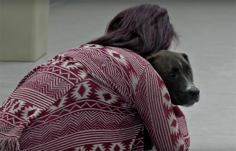 Former Female Inmate Who Trained Dog Adopts Him