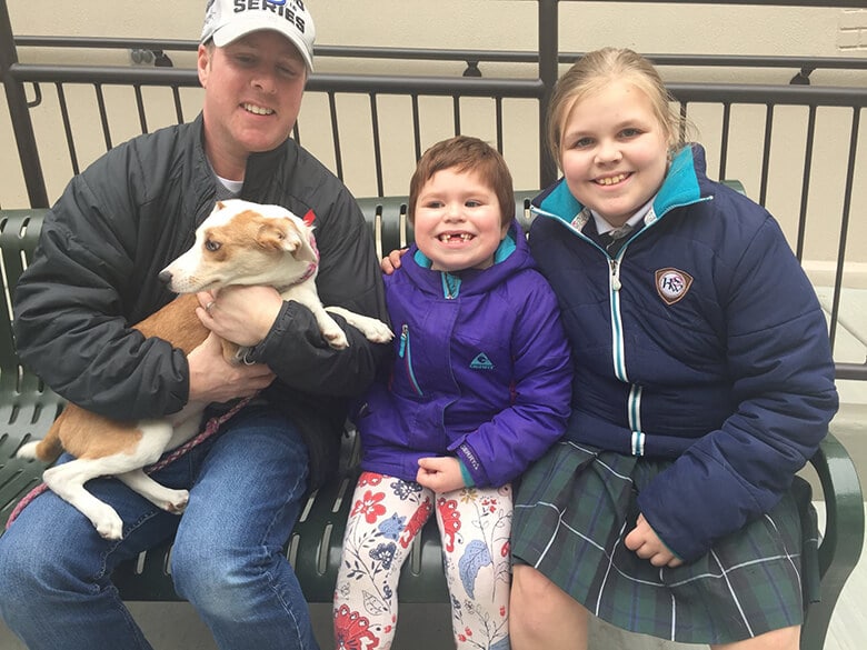 Girl With Cancer Gets Special 'Bear Hug' Thanks to a Dog