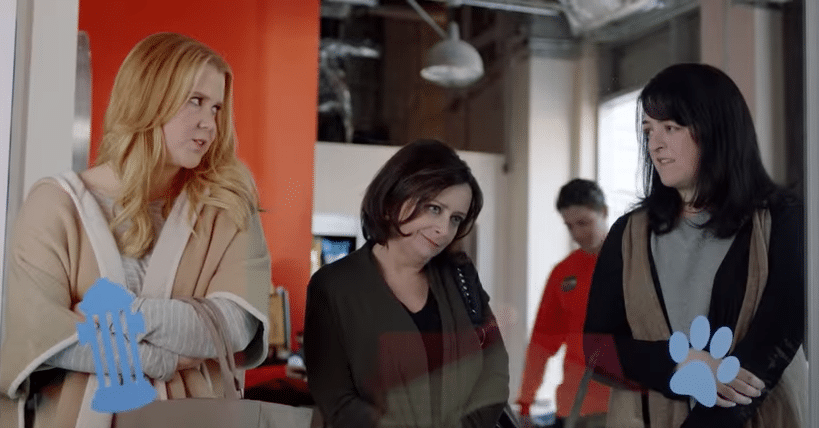 A group of women from the comedy series "Inside Amy Schumer" standing in front of a window.