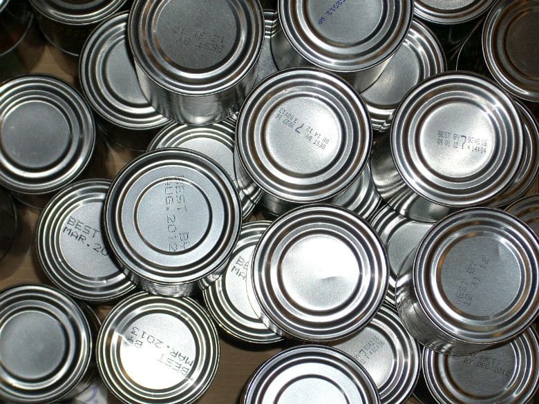 Lurking danger as cans of food are stacked on top of each other.