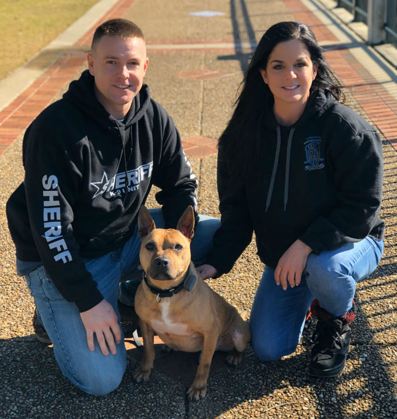 dog with two people