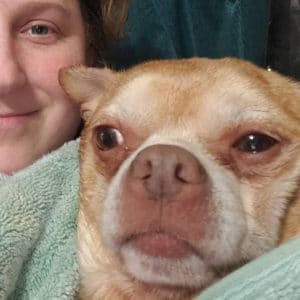A woman with a chihuahua in a towel went viral.