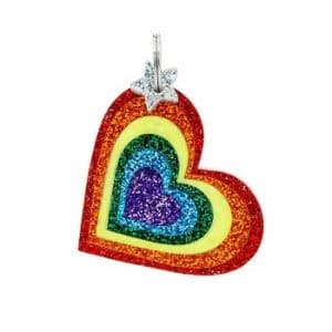 A favorite Pride essentials rainbow heart-shaped charm with glitter on it.