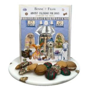 A holiday season calendar for dog parents with a dog on it, featuring some of the best Advent calendars.